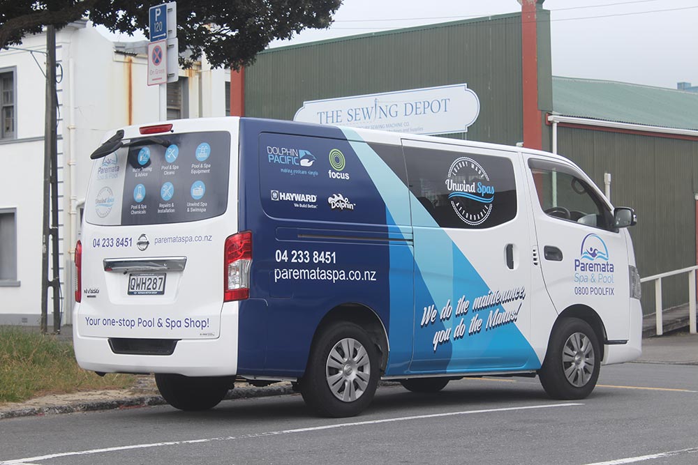 Blue wrap on white van